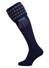 Navy blue knitted shooting socks with Ancient Blue and Mulberry pattern in the turnover top