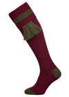 Burgundy knitted shooting socks with olive green pattern in the turnover top
