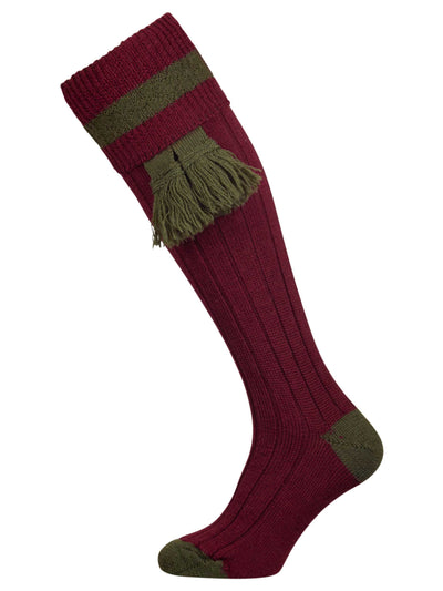 Burgundy knitted shooting socks with olive green pattern in the turnover top