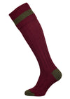 Burgundy knitted shooting socks with olive green pattern in the turnover top