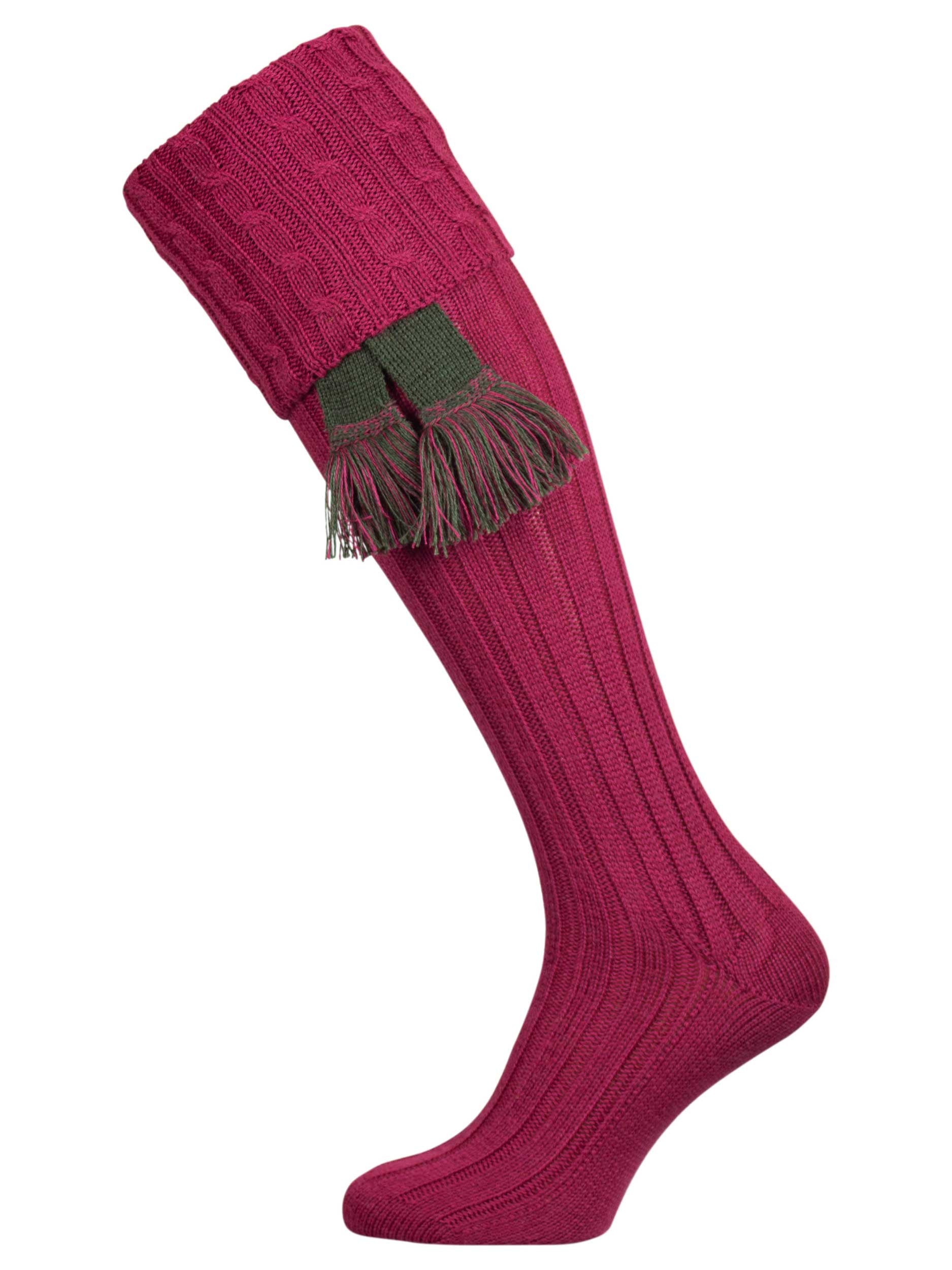 Long knitted shooting socks with a cable turnover in a deep pink purple.