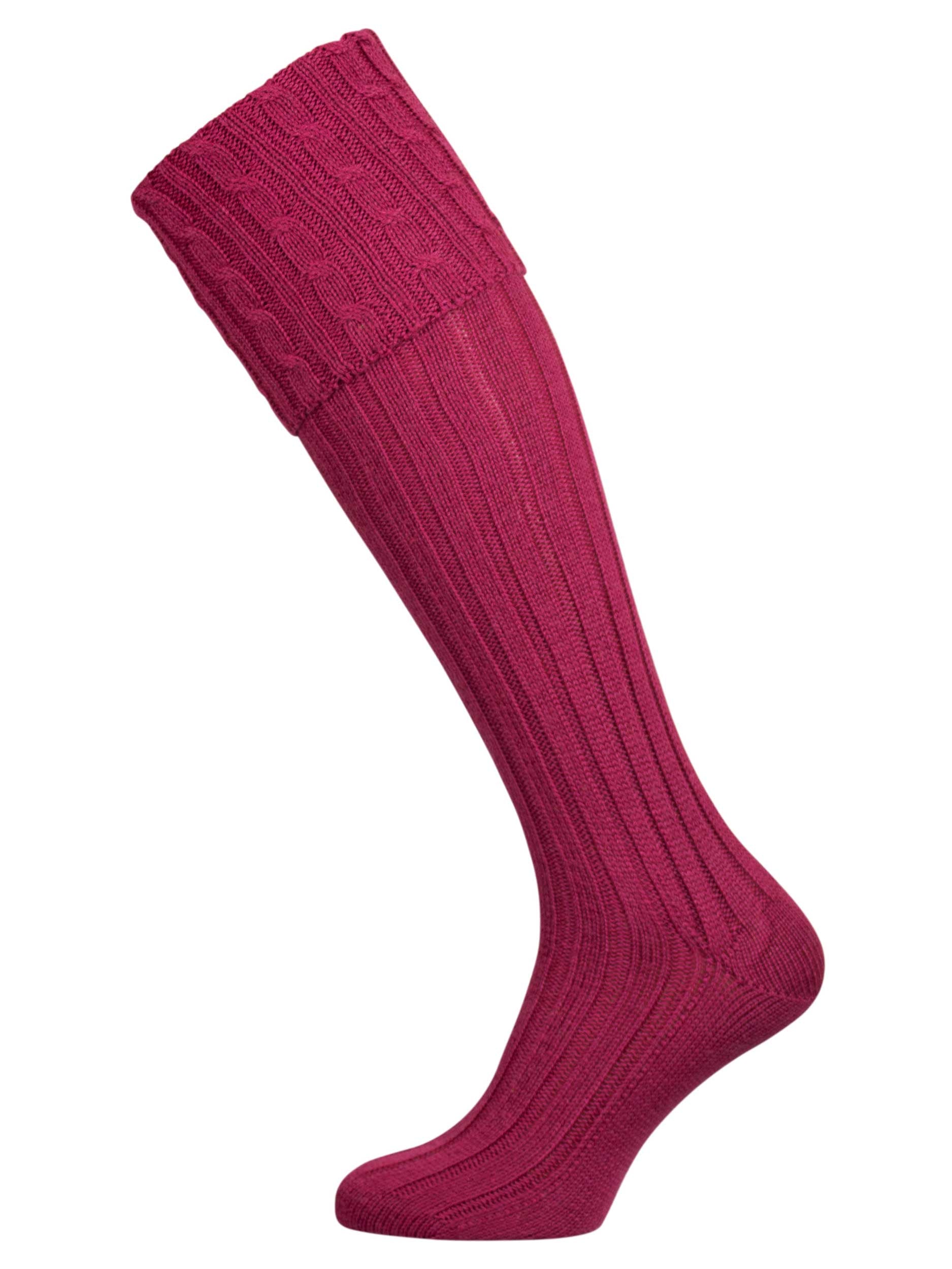 Long knitted shooting socks with a cable turnover in a deep pink purple.