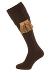 Shooting Sock knitted in dark brown with a cable knit turnover