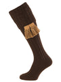 Shooting Sock knitted in dark brown with a cable knit turnover