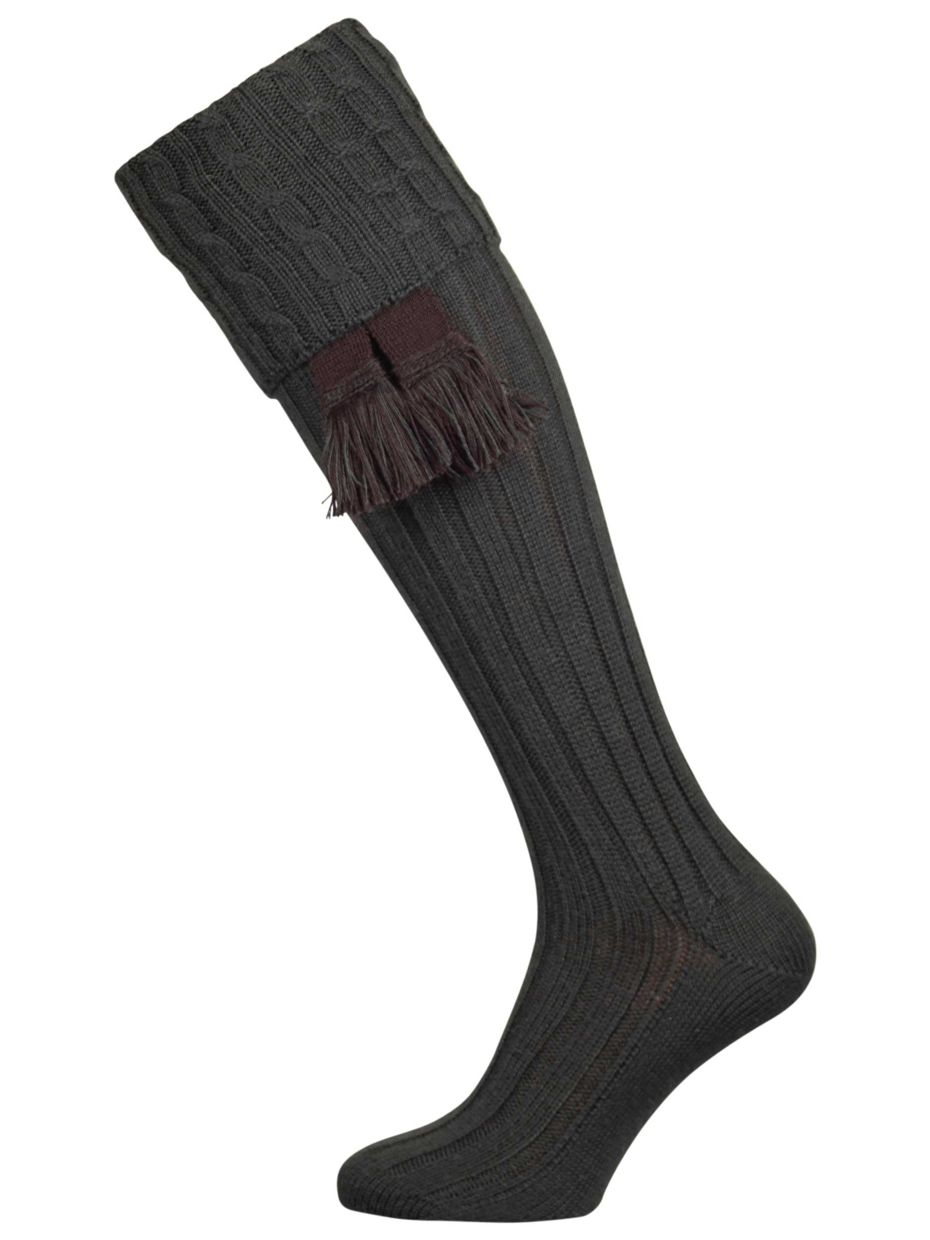 Long knitted shooting socks with a cable turnover in a very dark green.