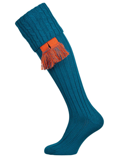 Long knitted shooting socks with a cable turnover in a rich teal petrol blue.