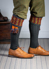 Long dark grey knitted shooting socks with a ribbed leg, features 8 different colours in the pattern turnover top.