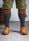 Long dark grey knitted shooting socks with a ribbed leg, features 8 different colours in the pattern turnover top.