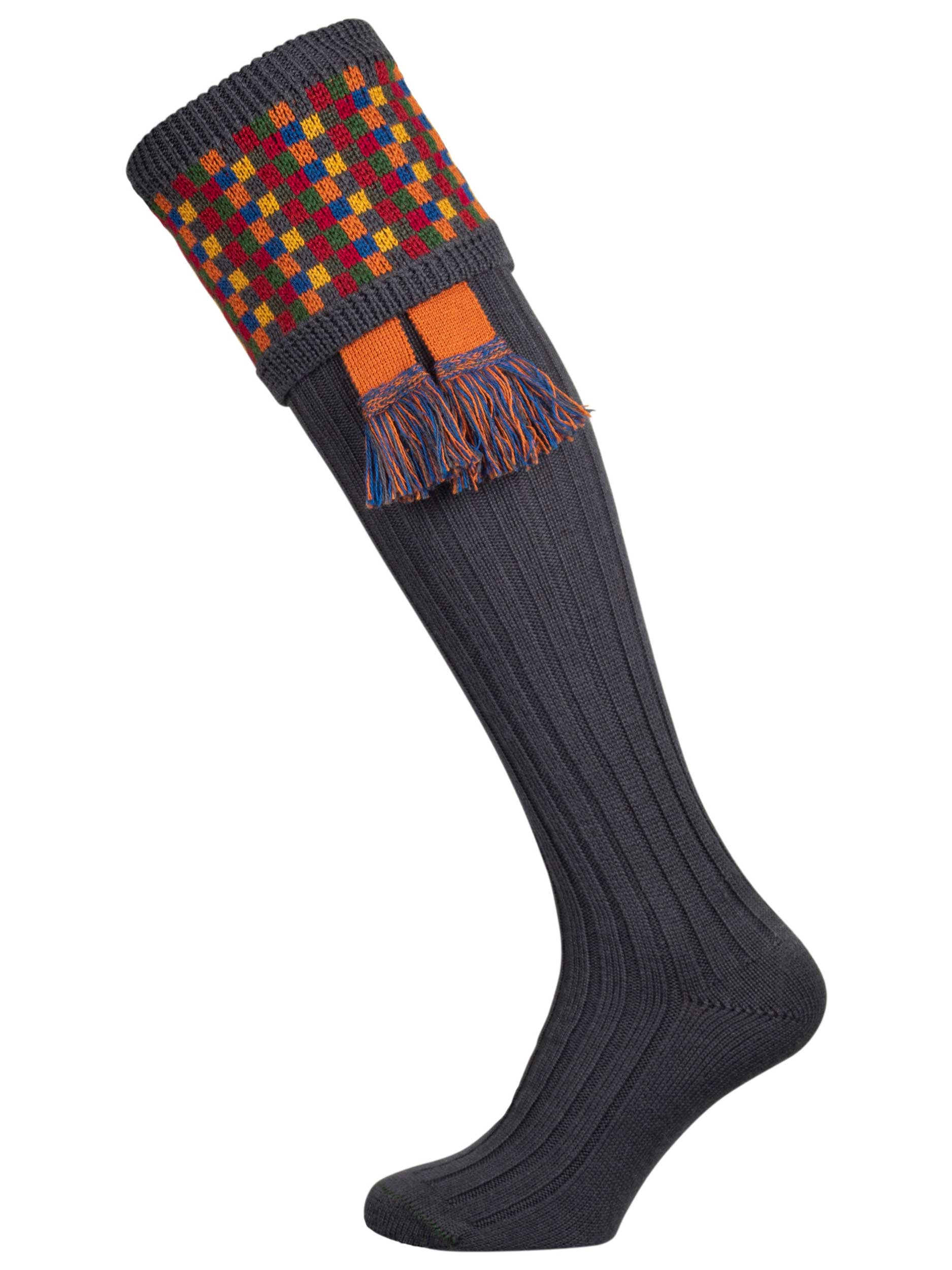 Long dark grey knitted shooting socks with a ribbed leg, features 8 different colours in the pattern turnover top.