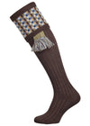 Long knitted shooting socks in earthy brown with a ribbed leg, features 8 different colours in the pattern turnover top.