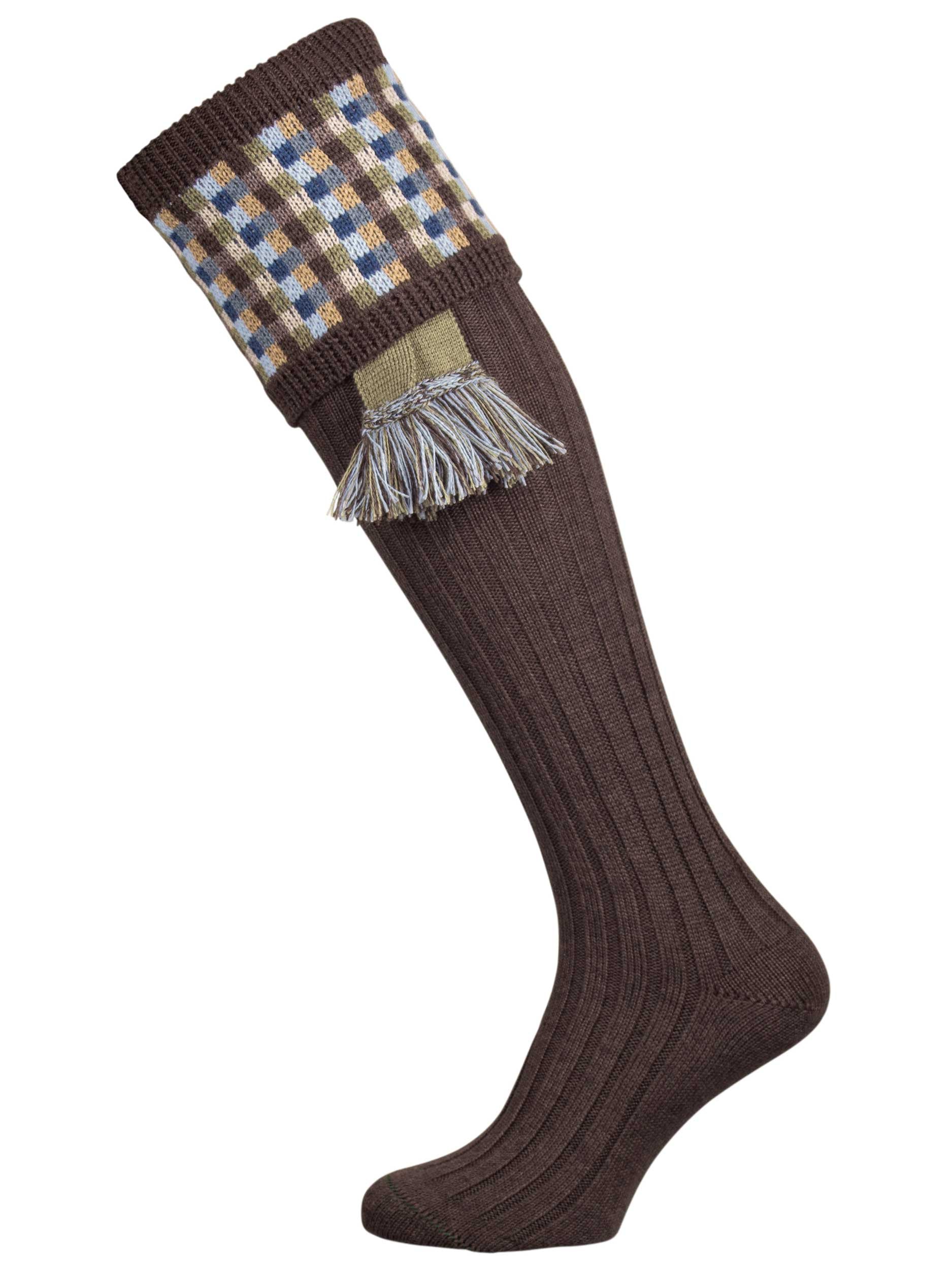 Long knitted shooting socks in earthy brown with a ribbed leg, features 8 different colours in the pattern turnover top.