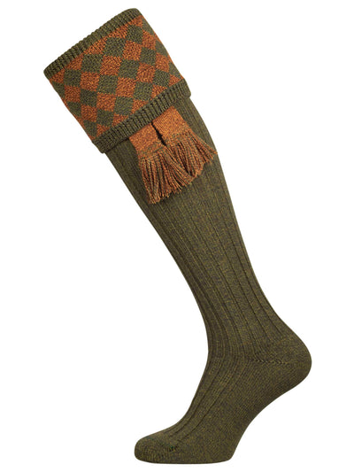 Traditional knitted shooting socks with a chessboard pattern in the turnover, in green and gold.