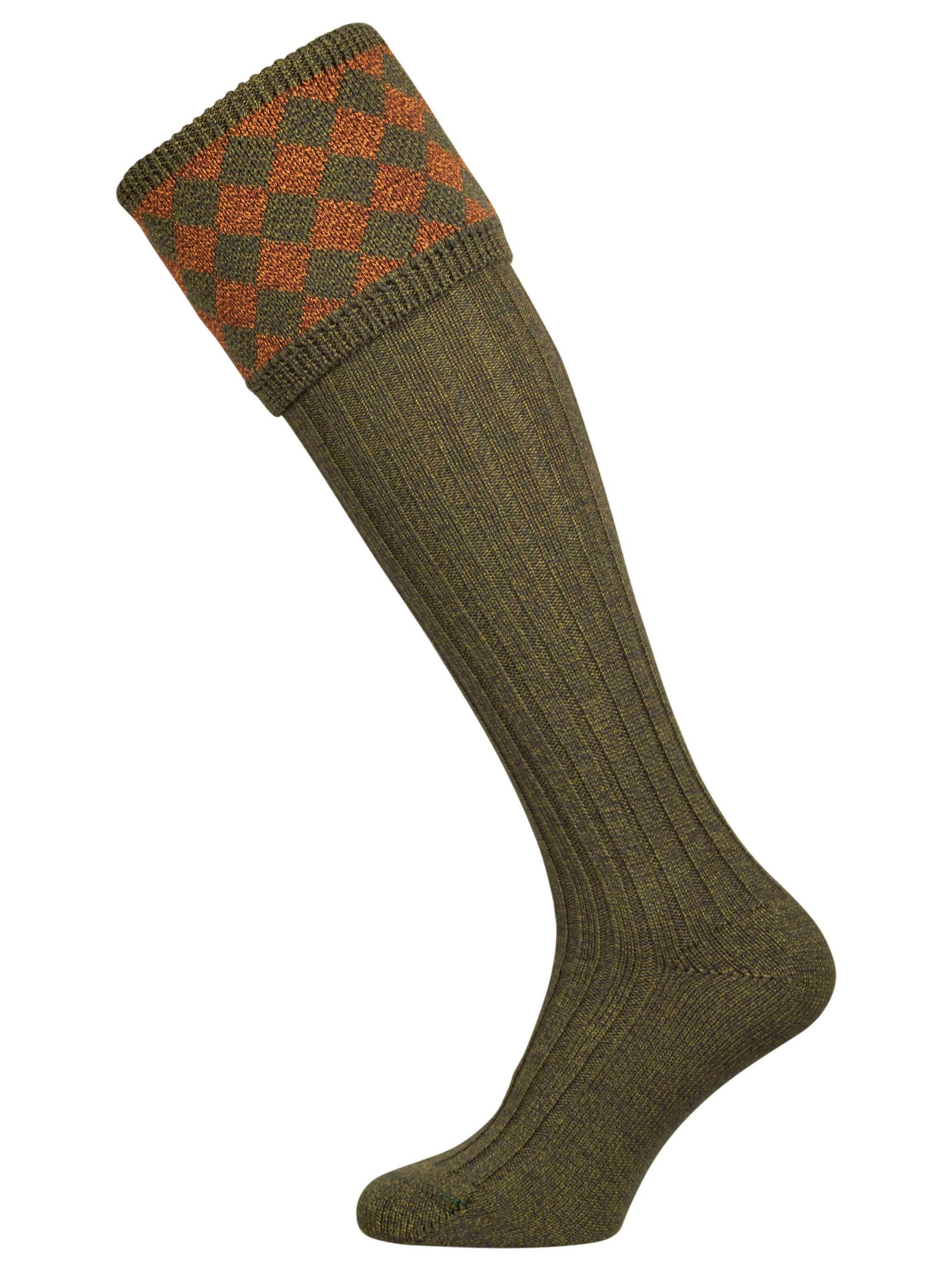 Traditional knitted shooting socks with a chessboard pattern in the turnover, in green and gold.