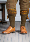 Green shooting socks with gold and bronze pattern.