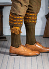 Green shooting socks with gold and bronze pattern.