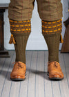 Green shooting socks with gold and bronze pattern.