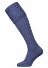 Plain blue shooting sock with trellis knitted pattern