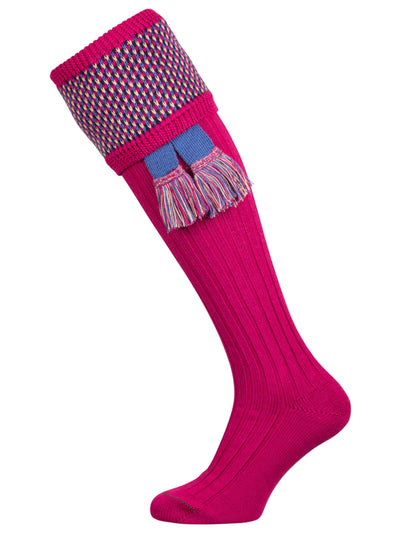 Pink knee-high sock with patterned top on a white background
