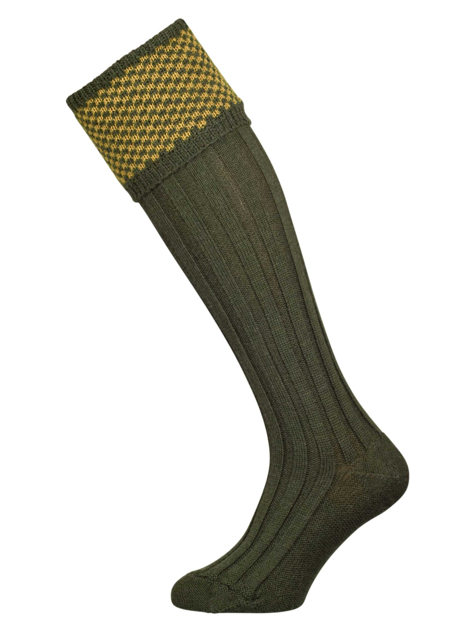 Wool shooting sock in green with a gold knitted pattern in the cuff