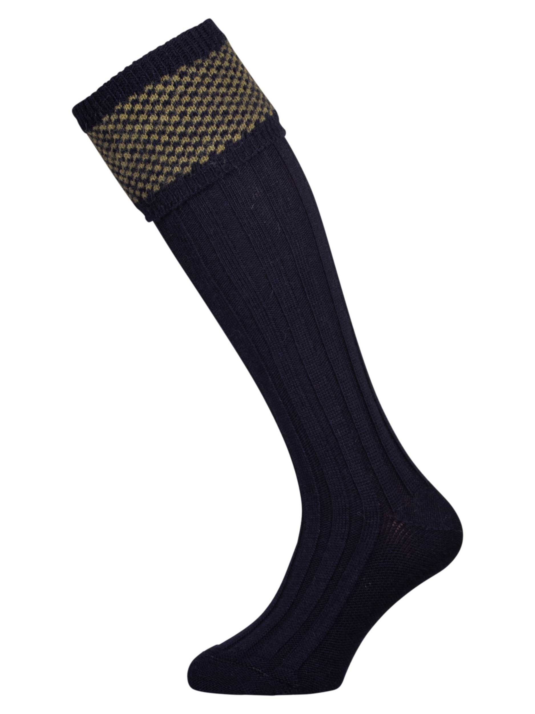 Wool shooting sock in navy blue with a sage green knitted pattern in the cuff