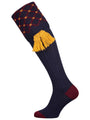 Merino wool shooting sock in navy blue with a gold and burgundy pattern knitted in the turnover
