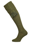 Knitted shooting socks with cable pattern though the leg and the turnover in khaki green
