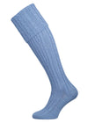 Knitted shooting socks with cable pattern though the leg and the turnover in sky blue