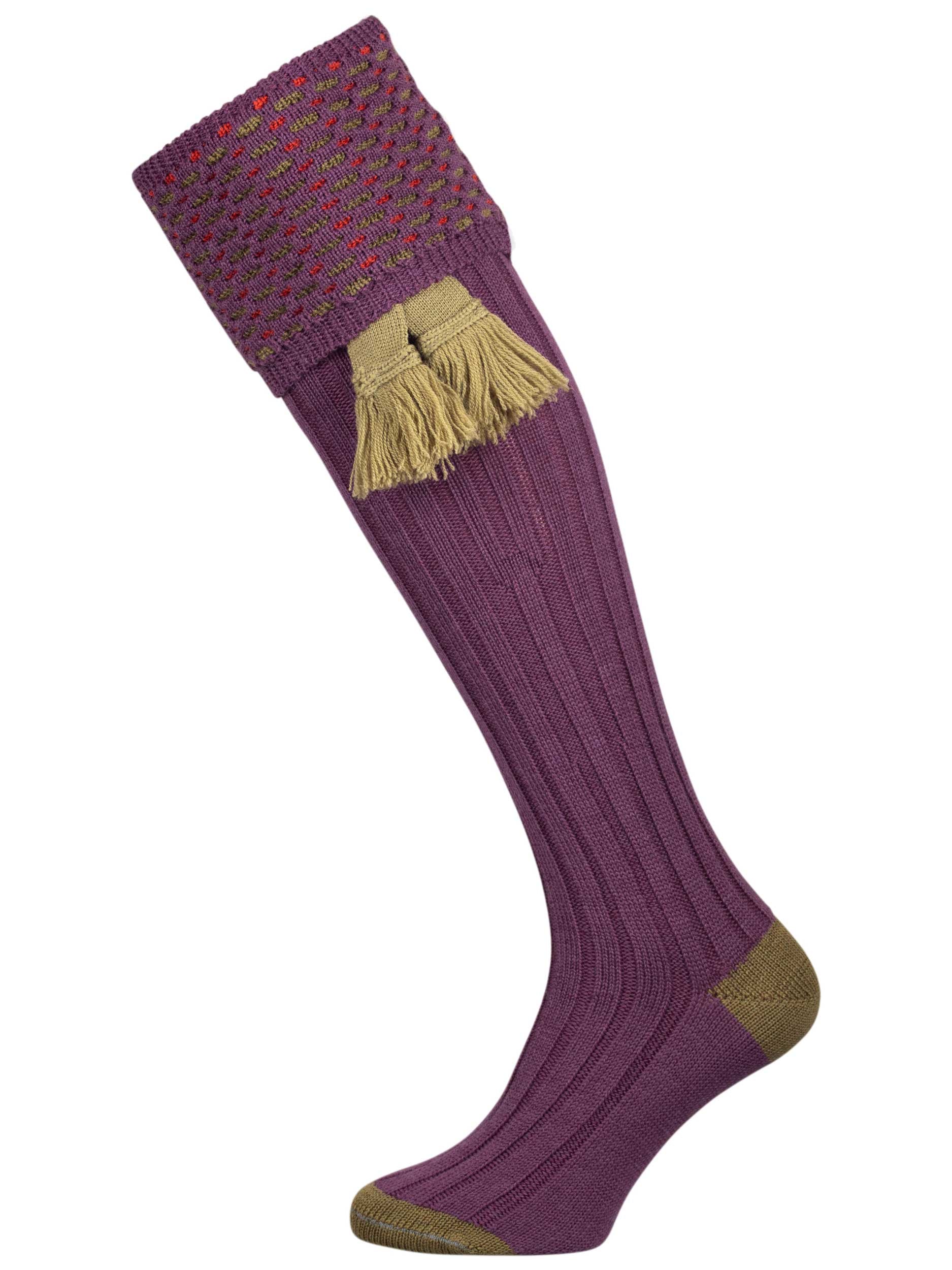 Merino wool shooting sock in mid purple with a green and salmon pattern knitted in the turnover