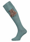 A lovat green plain full length knitted sock with turnover top and optional garter