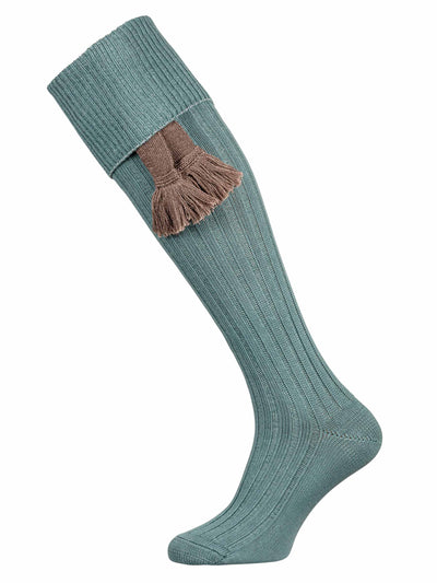 A lovat green plain full length knitted sock with turnover top and optional garter