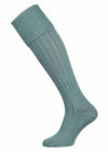 A lovat green plain full length knitted sock with turnover top.