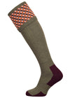 A contemporary technical shooting sock with supportive foot arch in dark olive with burgundy and orange pattern in the turnover