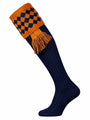 Navy blue knitted shooting sock with burnt orange chessboard pattern.