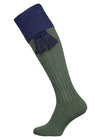 A green knee length cotton sock with navy turnover top for shooting