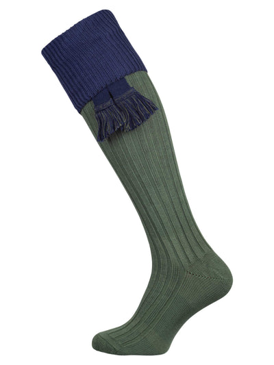 A green knee length cotton sock with navy turnover top for shooting