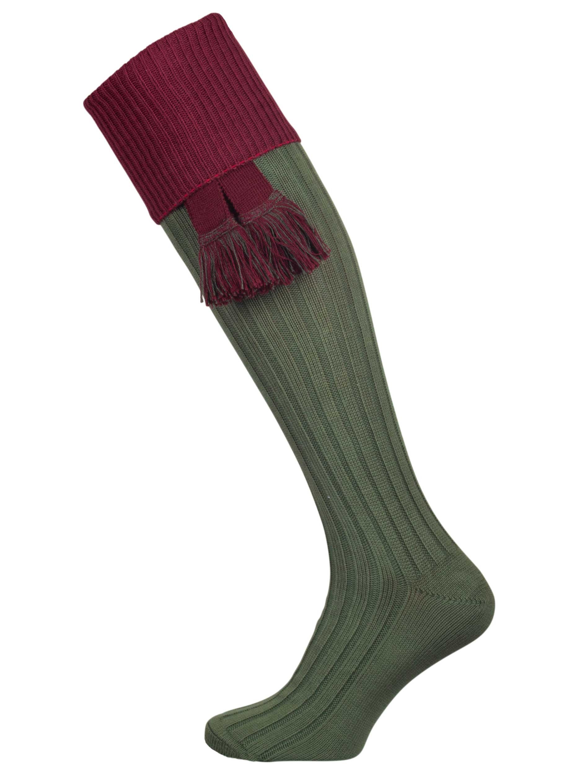 A green knee length cotton sock with burgundy turnover top for shooting