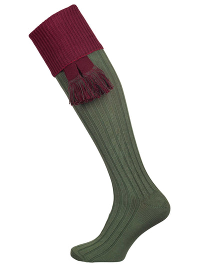 A green knee length cotton sock with burgundy turnover top for shooting