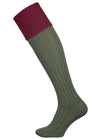 A green knee length cotton sock with burgundy turnover top for shooting
