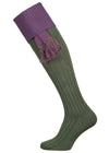 A green knee length cotton sock with purple turnover top for shooting