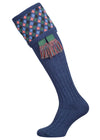 Long knitted shooting socks in mid blue with a ribbed leg, features 4 different colours in the argyle pattern turnover top.