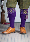 Long knitted shooting socks in bright purple with a ribbed leg, features 4 different colours in the argyle pattern turnover top.
