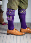 Long knitted shooting socks in bright purple with a ribbed leg, features 4 different colours in the argyle pattern turnover top.