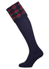 Merino wool shooting sock in navy blue with a burgundy and hunter green pattern knitted in the turnover