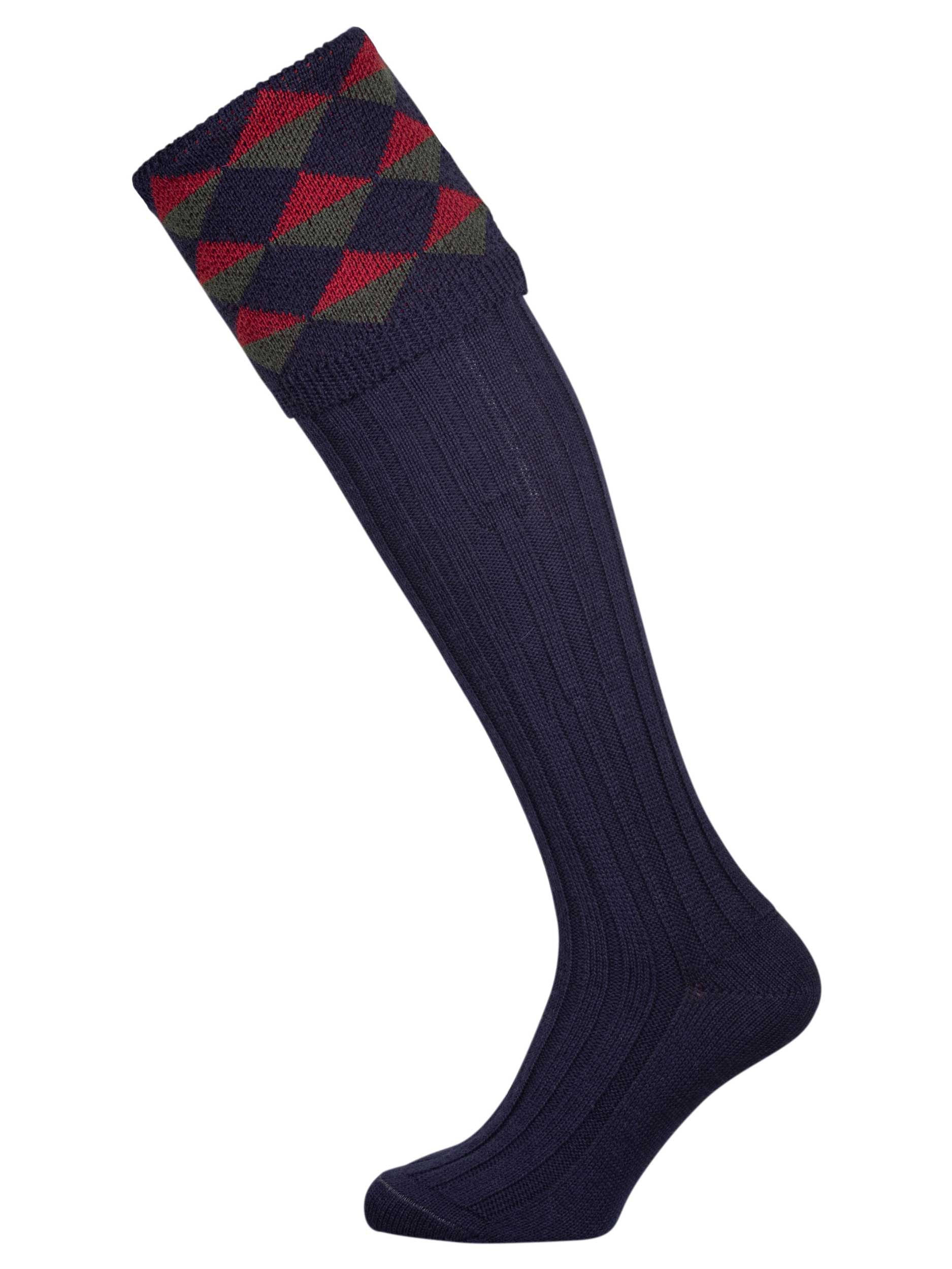 Merino wool shooting sock in navy blue with a burgundy and hunter green pattern knitted in the turnover