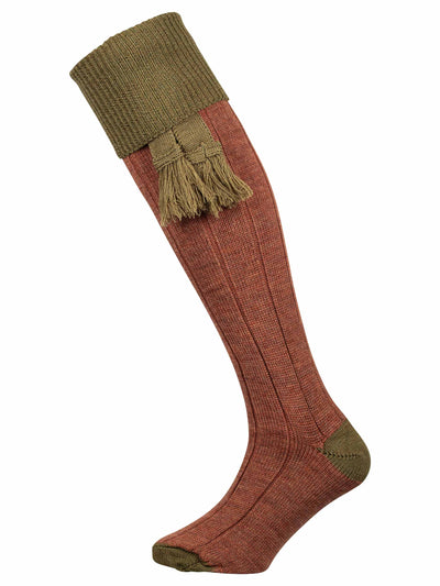 Brown full length merino wool sock with green turnover top and matching garter tie