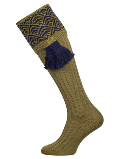 Merino wool shooting sock with a sage green ribbed leg and a navy blue pattern knitted in the turnover