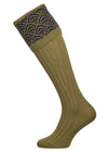 Merino wool shooting sock with a sage green ribbed leg and a navy blue pattern knitted in the turnover