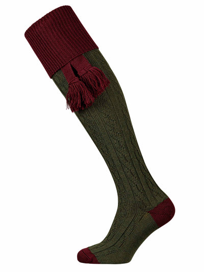 Dark green shooting sock with cable knit detail in the leg and deep burgundy turnover with optional burgundy garter tie.
