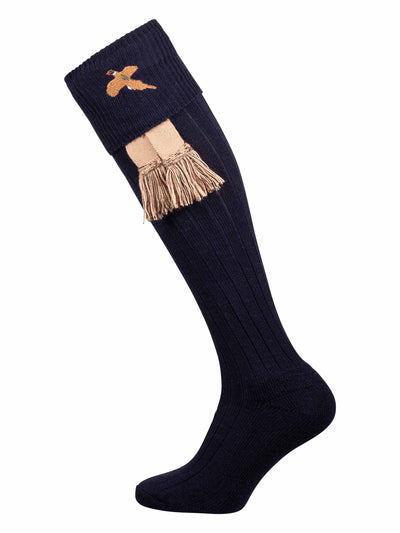 Long knitted sock with turnover top in navy blue with optional camel coloured garter tie