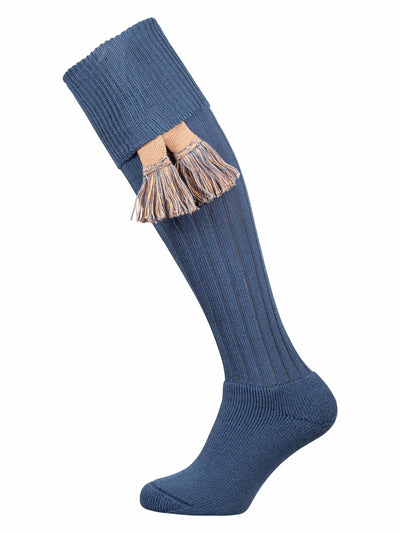 Full length knitted merino wool socks in pale blue with optional beige garter ties